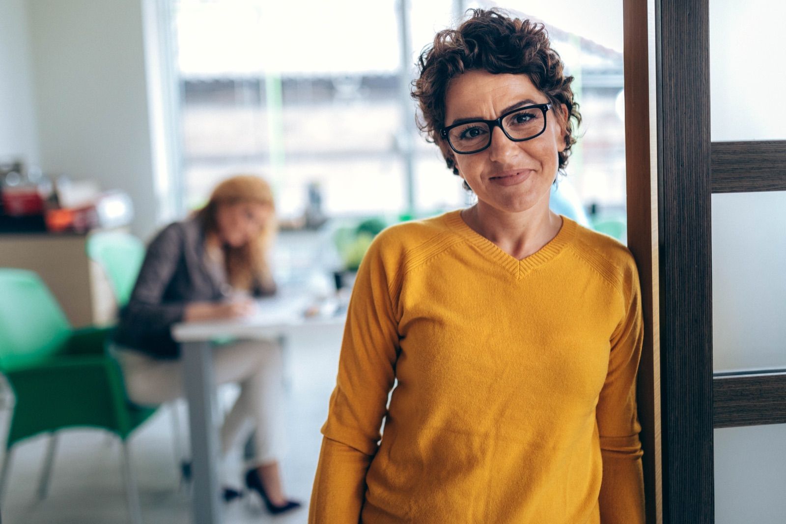 Smiling woman in an office